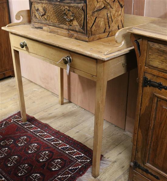 An early 19th century pine washstand W.95cm